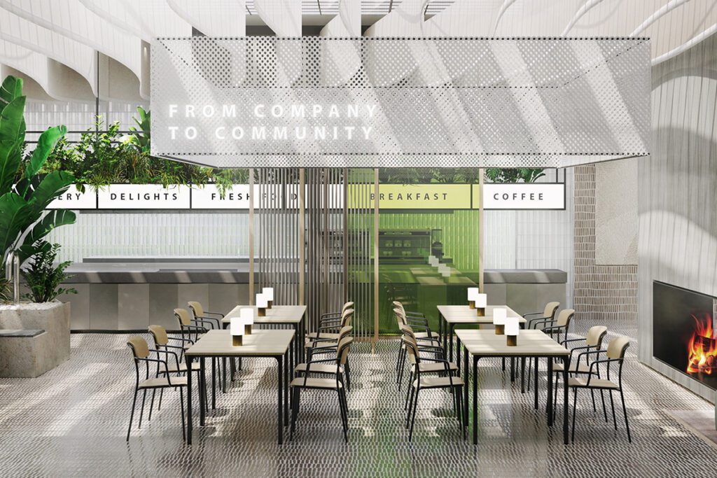 Eine Brunner-Cafeteria mit dem Motto 'FROM COMPANY TO COMMUNITY', eingerichtet mit eleganten Tischen und Stühlen für eine gemütliche Pausenatmosphäre.